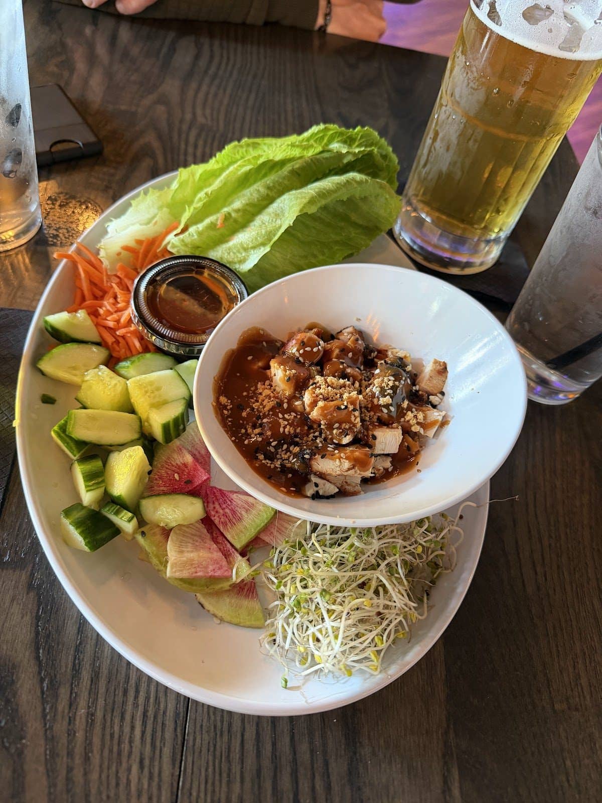 A plated shareable and a pint on the patio at The Nut House in Kent